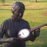 Marietta Johnson statue with banza